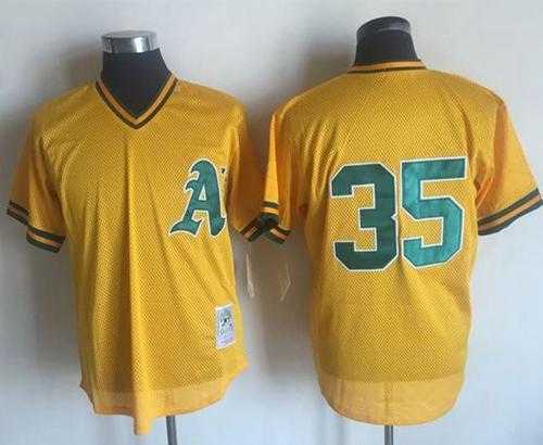 Mitchell And Ness 1984 Oakland Athletics #35 Rickey Henderson Yellow Throwback Stitched MLB Jersey